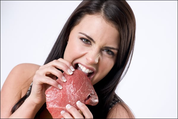 600px-woman-eating-meat